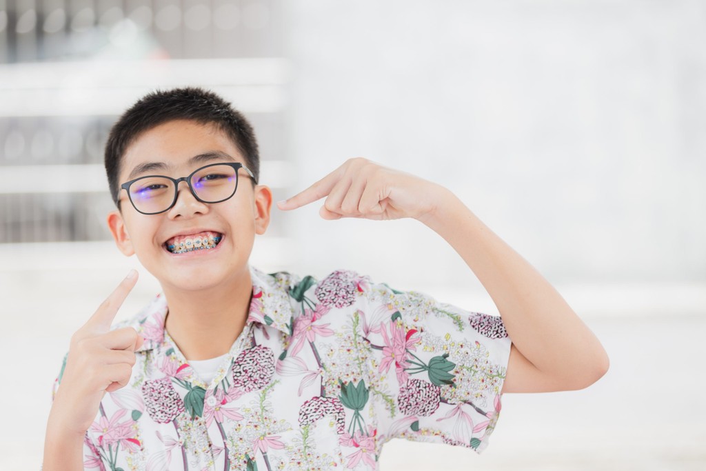 Boy Smiling with Braces