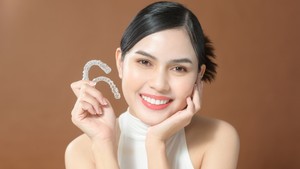 Do You Need New Aligners If You Get a Crown Mid-Treatment?