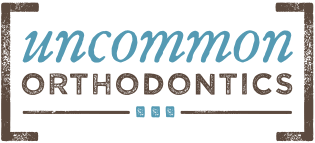 Uncommon Orthodontics logo